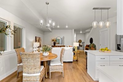 Dining table with the kitchen beyond