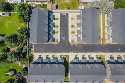 Directly overhead — patios, drive, parking
