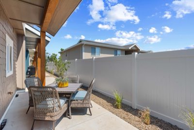 Covered patio and fenced yard