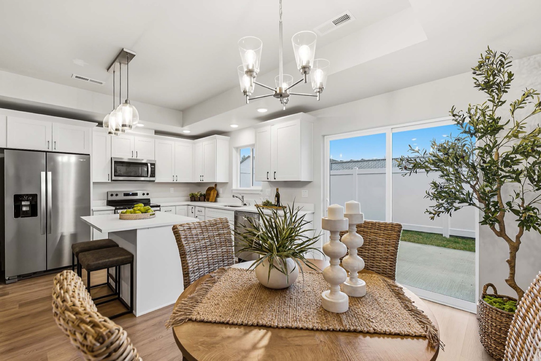 Red Apple model home — kitchen (staged; finishes may vary by unit)